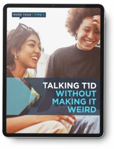 Tablet displaying the More Than Type 1 guide cover 'Talking T1D Without Making It Weird,' featuring two young women laughing together outdoors.